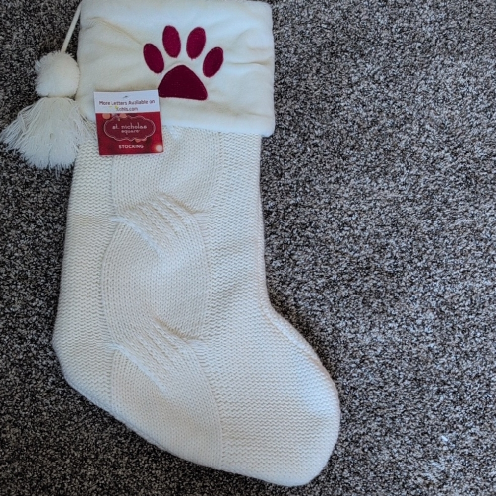 St. Nicholas Square Cream Dog Stocking with Red Paw